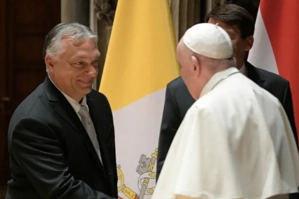 Pope Francis greets Hungarian Prime Minister Viktor Orbán and President János Áder in Budapest, Sept. 12, 2021. Vatican Media