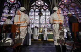 Archbishop Michel Aupetit, center left, celebrates Mass at Notre-Dame Cathedral, Paris, France, June 16, 2021. Thomas Samson/ Pool/AFP via Getty Images.