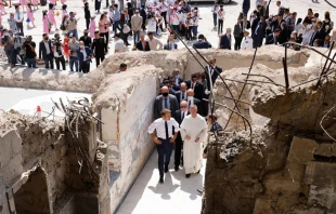 French President Emmanuel Macron tours Our Lady of the Hour Church in Mosul, Iraq, Aug. 29, 2021. Ludovic Marin/AFP via Getty Images.