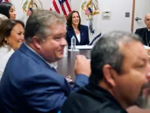 Vice President Kamala Harris (center-back) and Bishop Mark Seitz of El Paso (back right) at an immigration roundtable at El Paso International Airport on Friday, June 25, 2021.