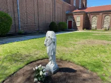 A statue of Christ at St. Charles Borromeo parish in Waltham, Mass., that was vandalized May 2-3, 2021.