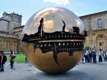 A bronze sculpture, Sphere Within Sphere, by Arnaldo Pomodoro at the Vatican Museums.