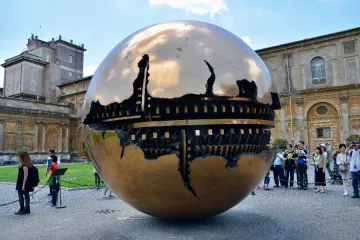 A bronze sculpture by Arnaldo Pomodoro at the Vatican Museums
