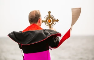 Archbishop Eamon Martin holds a reliquiary containing relics of Auschwitz martyr St. Maximilian Kolbe in Warrenpoint, Northern Ireland, Sept. 5, 2021. Anita Hoppe.