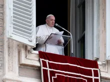 Pope Francis speaks during the Angelus prayer.