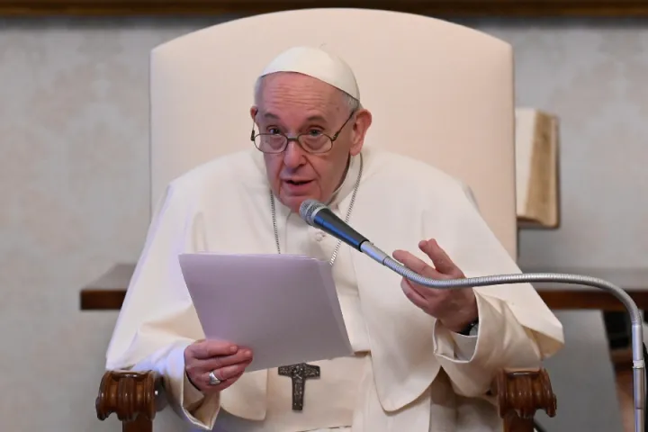 Pope Francis gives his general audience address in the library of the Apostolic Palace April 28, 2021.