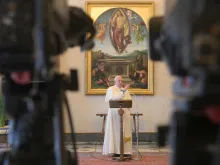 Pope Francis delivers a Regina Coeli address in the library of the Apostolic Palace.