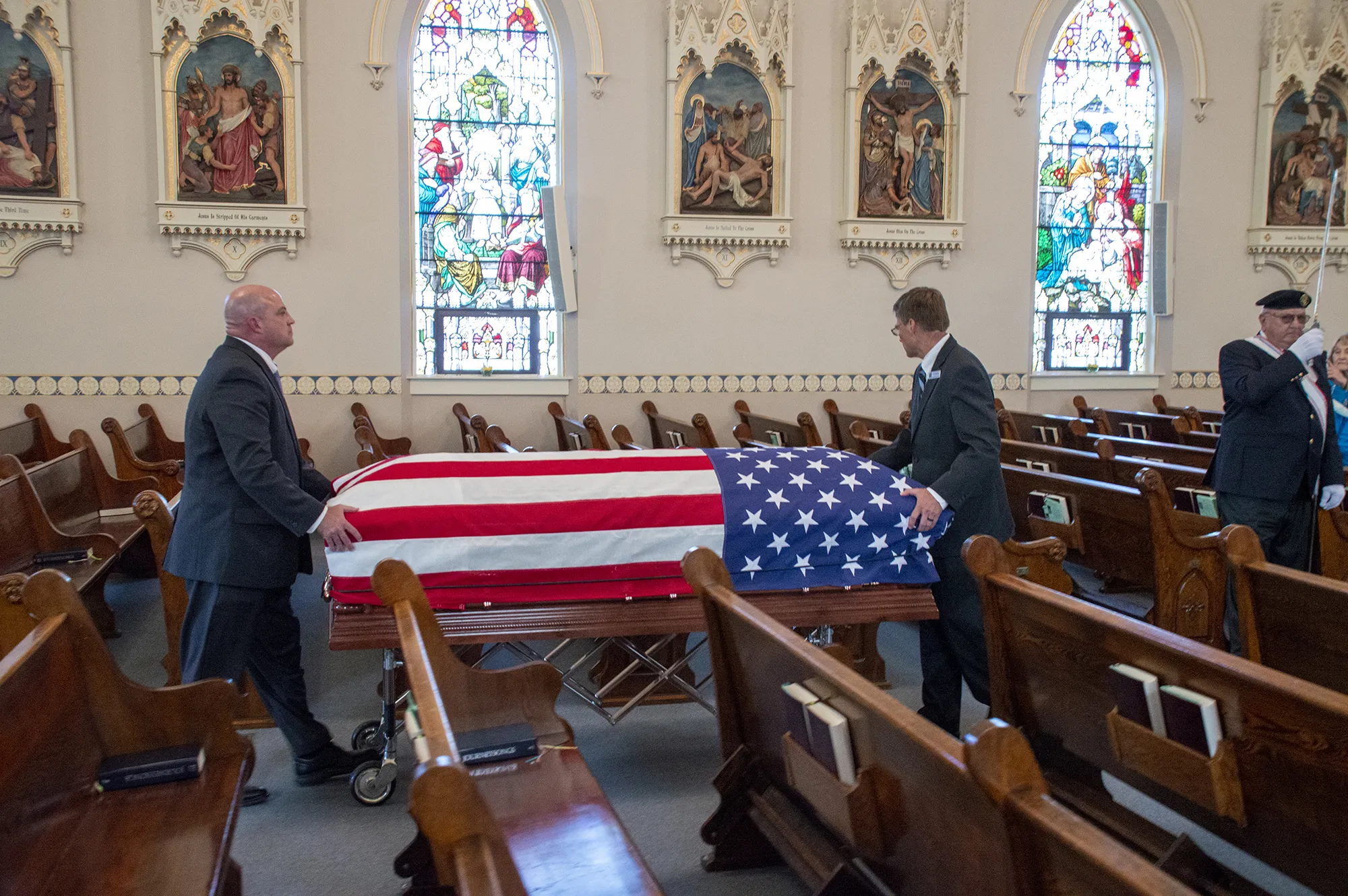 A coffin containing the remains of Fr. Emil Kapaun is taken to the front of St. John Nepomucene Church in Pilsen, Kan., Sept. 25, 2021.?w=200&h=150