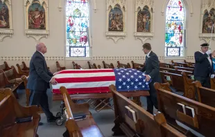 A coffin containing the remains of Fr. Emil Kapaun is taken to the front of St. John Nepomucene Church in Pilsen, Kan., Sept. 25, 2021. Chris Riggs/Catholic Advance