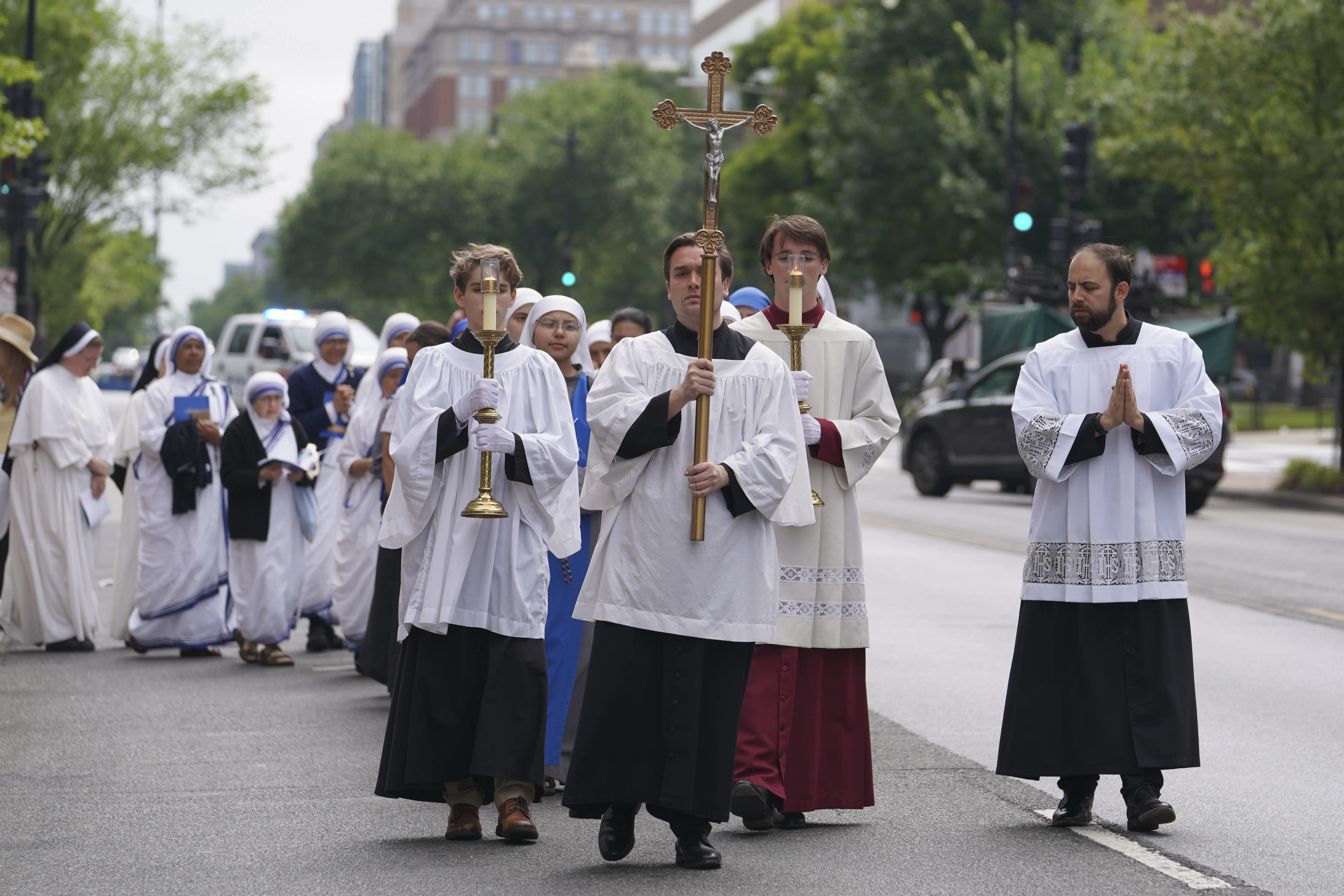 A few hundred Catholics marched through the streets of Washington, D.C., to publicly pray and adore the body of Christ during a eucharistic procession on Saturday, May 20, 2023.?w=200&h=150