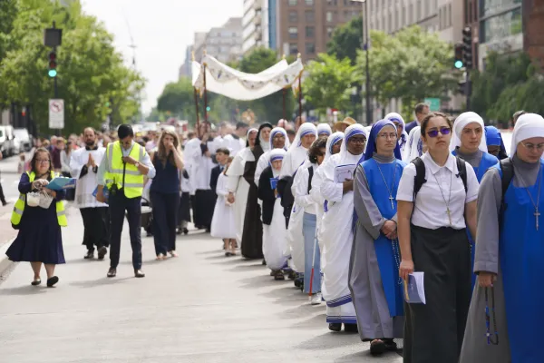 A few hundred Catholics marched through the streets of Washington, D.C., to publicly pray and adore the body of Christ during a eucharistic procession on Saturday, May 20, 2023. Credit: Joe Portolano/CNA