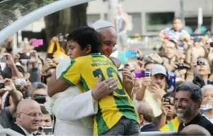 Nathan de Brito hugs Pope Francis during his visit to Rio de Janeiro for World Youth Day 2013. Credit: Nathan de Brito/personal file