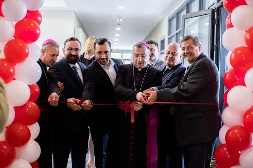 Chaldean Catholic Archbishop Bashar Warda (center), joined Alejandro Bermudez (far right), executive editor of the ACI Group and Catholic News Agency, and other dignitaries and staff members at a ceremony marking the launch of the Arabic-language news agency in Erbil, Iraq, on March 25, 2022.?w=200&h=150