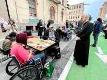 Archbishop Salvatore Cordileone meets with people experiencing homeless at St. Anthony’s Dining Hall in San Francisco's Tenderloin neighborhood on November 6, 2021.
