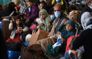 Afghan refugees are being processed inside Hangar 5 at Ramstein Air Base in Germany, Sept. 8, 2021. Olivier Douliery/POOL/AFP via Getty Images.