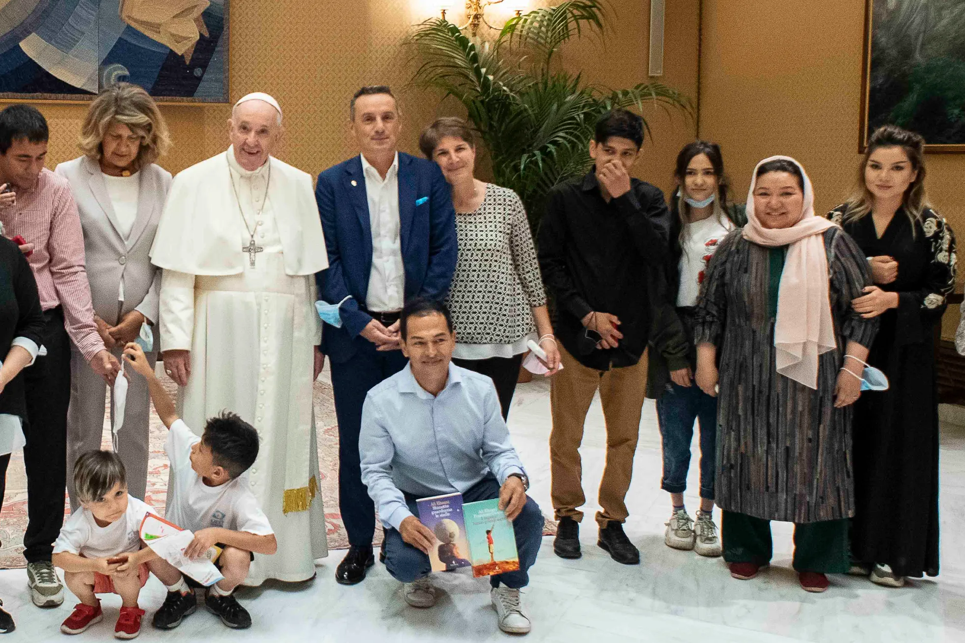 Pope Francis meets with a group of Afghan refugees at the Vatican on Sept. 22, 2021.?w=200&h=150