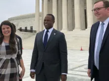 Matthew Kuhn, Principal Deputy Solicitor General of Kentucky (right), along with Daniel Cameron, Attorney General of Kentucky (center) and his wife Makenze (left), outside the U.S. Supreme Court on Oct. 12, 2021.