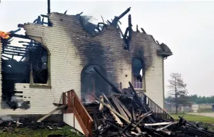 The loss of St. Bernard’s Church in Grouard, Alberta, Canada, on May 22, 2023, makes a sad moment for those with memories of the church, said Grouard-McLennan Archbishop Gerard Pettipas. Two men have been arrested in connection with the fire. Credit: Archdiocese of Grouard-McLennan photo/B.C. Catholic