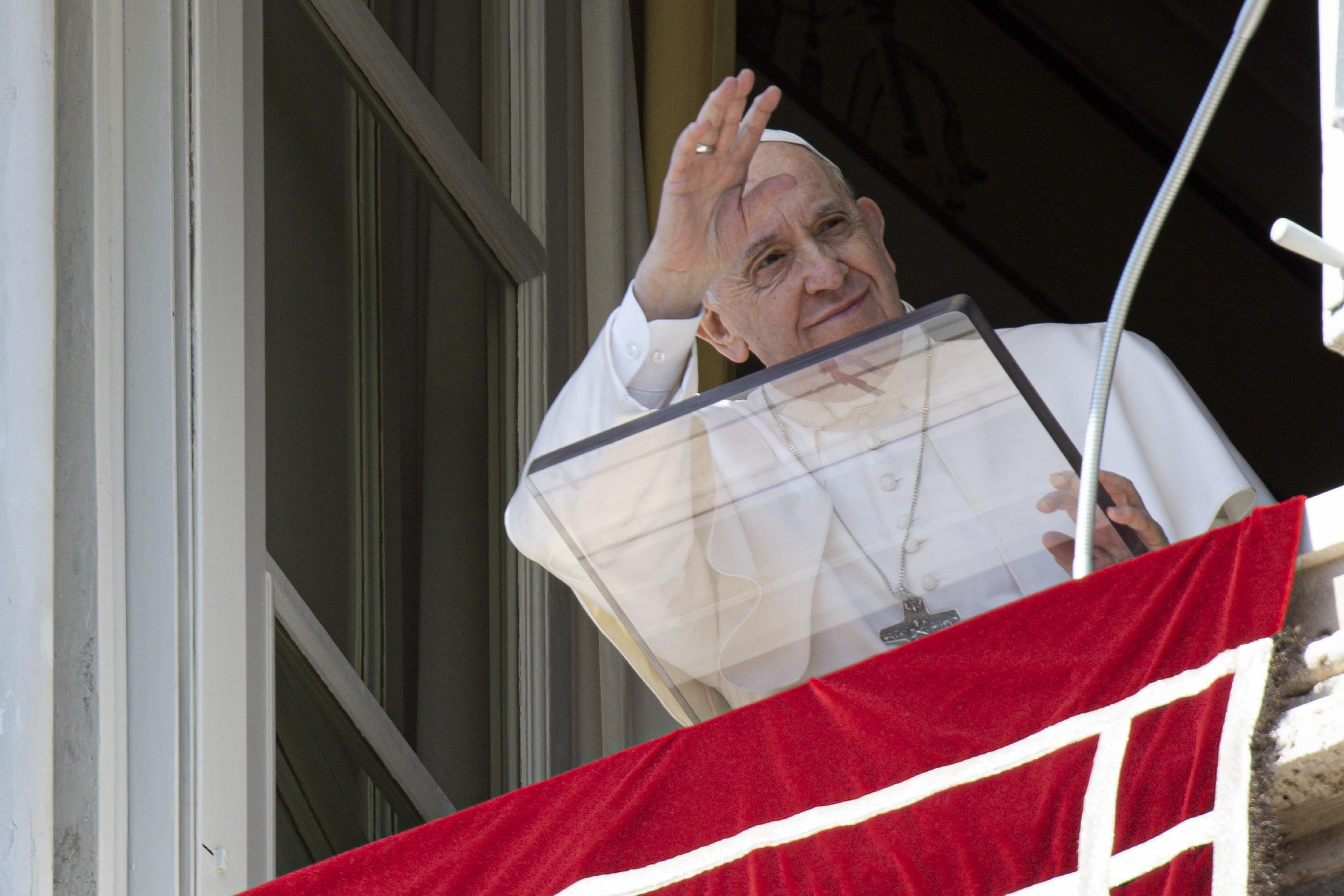 Pope Francis waves to crowd gathered for the Angelus at St. Peter's Square on March 13, 2022.?w=200&h=150