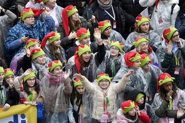 Pilgrims wearing crowns in observance of the solemnity of the Epiphany of the Lord react to Pope Francis during a special Angelus for the feast day in St. Peter's Square on Jan. 6, 2024. Credit: Vatican Media