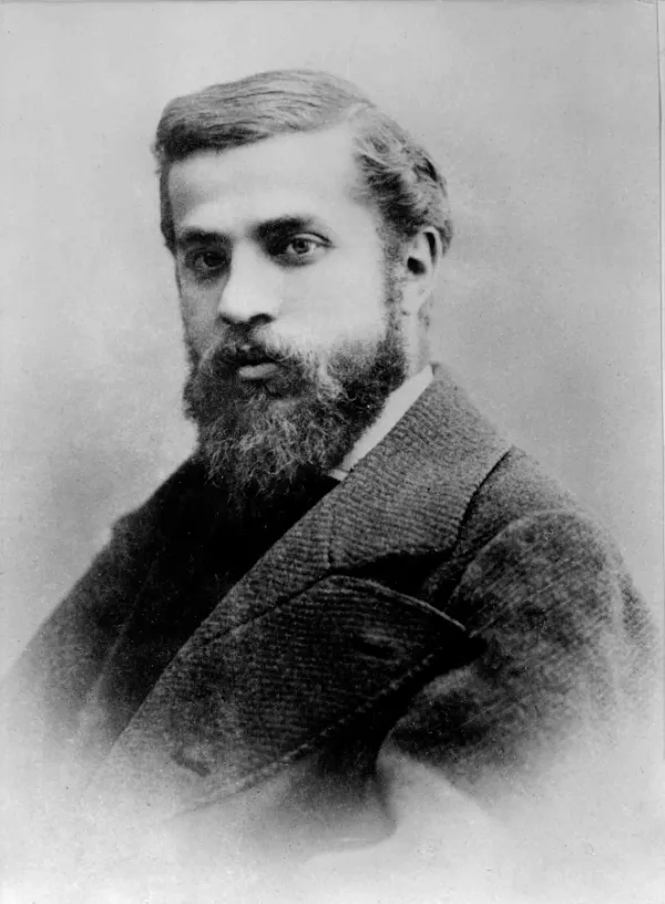 A portrait of architect Antoni Gaudí in 1878, by Pau Audouard. Public domain.