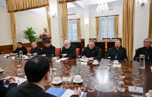 Vatican Secretary for Relations with States Archbishop Paul Gallagher (center) meets with Vietnamc’s Foreign Minister Bui Thanh Son (unseen) and other officials at the Foreign Ministry in Hanoi on April 9, 2024. Credit: NHAC NGUYEN/POOL/AFP via Getty Images
