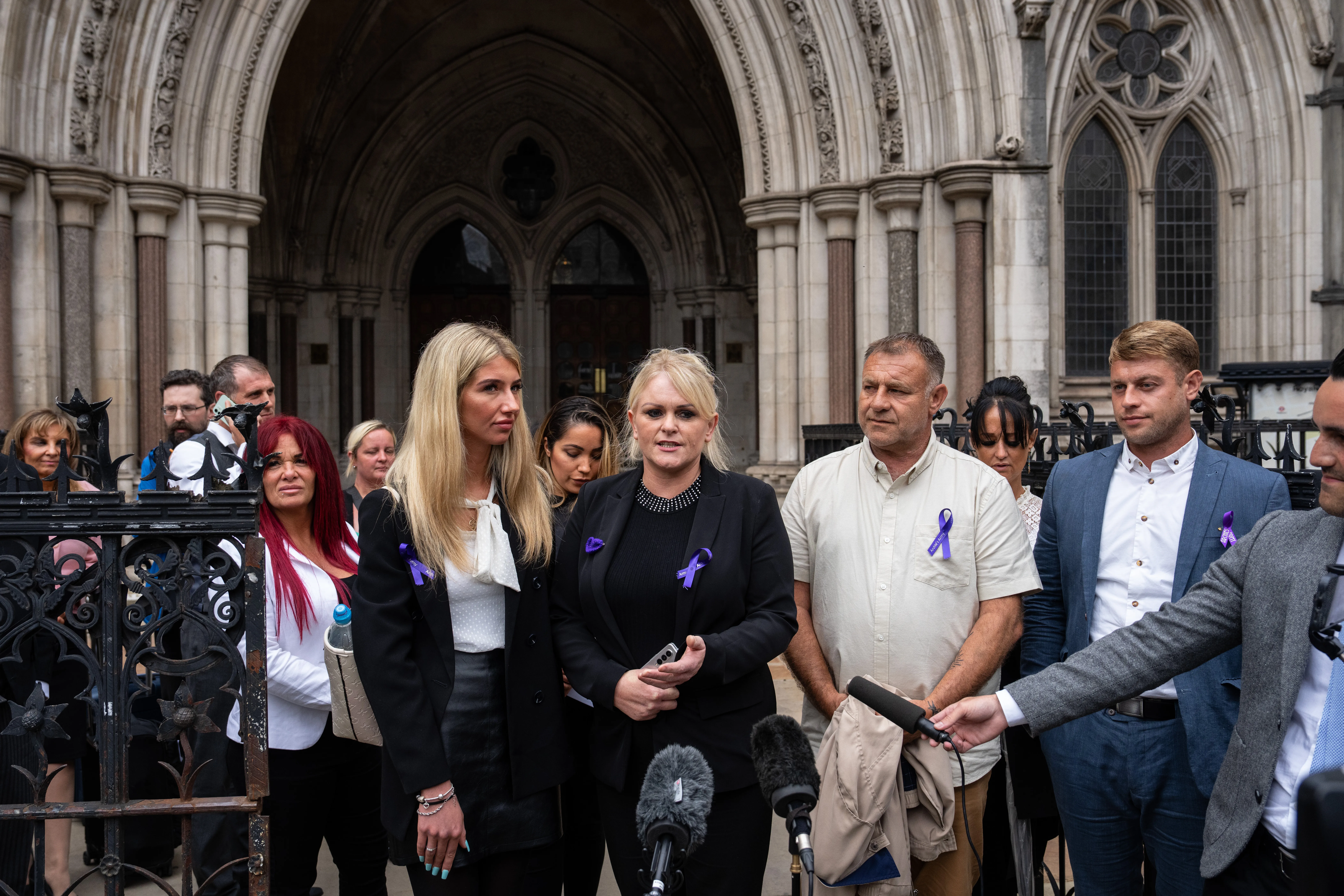 Hollie Dance (center left) and Paul Battersbee (center right)), the mother and father of Archie Battersbee, speak to the media as they leave the Royal Courts of Justice on June 29, 2022 in London, England. Archie's parents ultimately lost their legal fight to keep their son on life support. He died on Aug. 6, 2022.?w=200&h=150