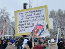 A sign features St. Teresa of Calcutta (Mother Teresa) at the 51st March for Life, Friday, Jan. 19, 2024.