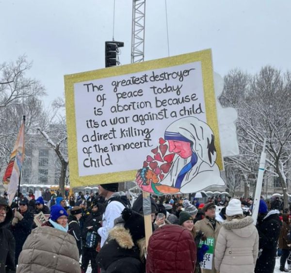 A sign features Mother Teresa at the 51st March for Life, Jan. 19, 2024. Credit: Christina Herrera / EWTN News