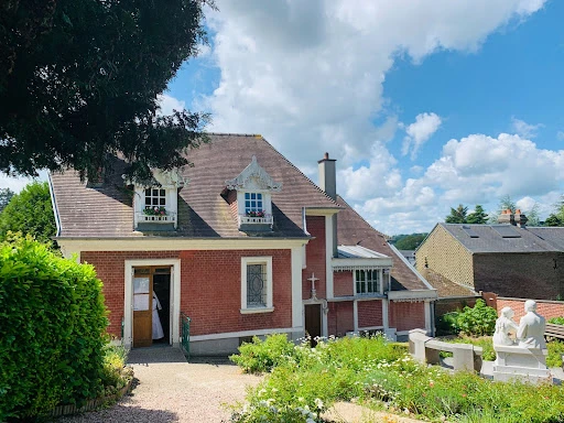 The backyard of St. Thérèse’s childhood home in Lisieux, France.?w=200&h=150