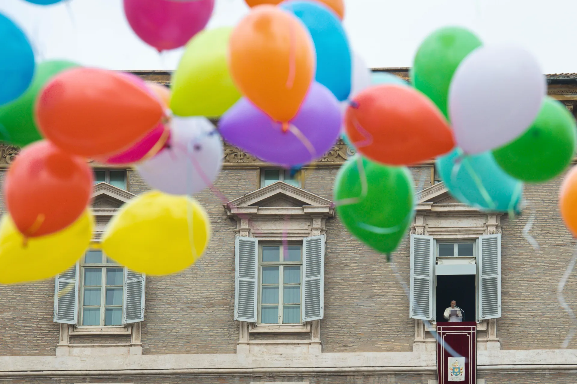 Children participating in a Catholic Action initiative helped to release colorful balloons at the end of the Angelus on Jan. 30, 2022.?w=200&h=150