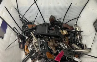 The Archdiocese of Baltimore said it acquired several hundred guns as part of a “buyback” program financed by local parishes and individual donors on Aug. 5, 2023. Credit: Baltimore Police Department