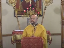 A screenshot of a YouTube video of Bishop-elect Francois Beyrouti giving a homily on July 31, 2022.