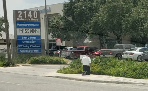 Bishop Emeritus Michael Pfeifer of San Angelo, Texas, prays in front of a Planned Parenthood facility. Credit: Courtesy of Bishop Pfeifer