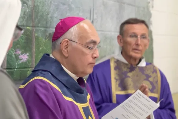 Bishop Joe Vasquez (center) of the Diocese of Austin celebrates Mass in the Mountain View Unit prison in Gatesville, Texas, which houses the state's female death row, on Dec. 1, 2023. Credit: Catholic Prison Ministries Coalition/TDCJ Communications