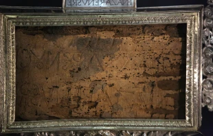 The Titulus Crucis, the title panel of the True Cross on which Jesus was crucified. Written in Latin and Greek, it says "Jesus the Nazarene King of the Jews." Daniel Ibanez