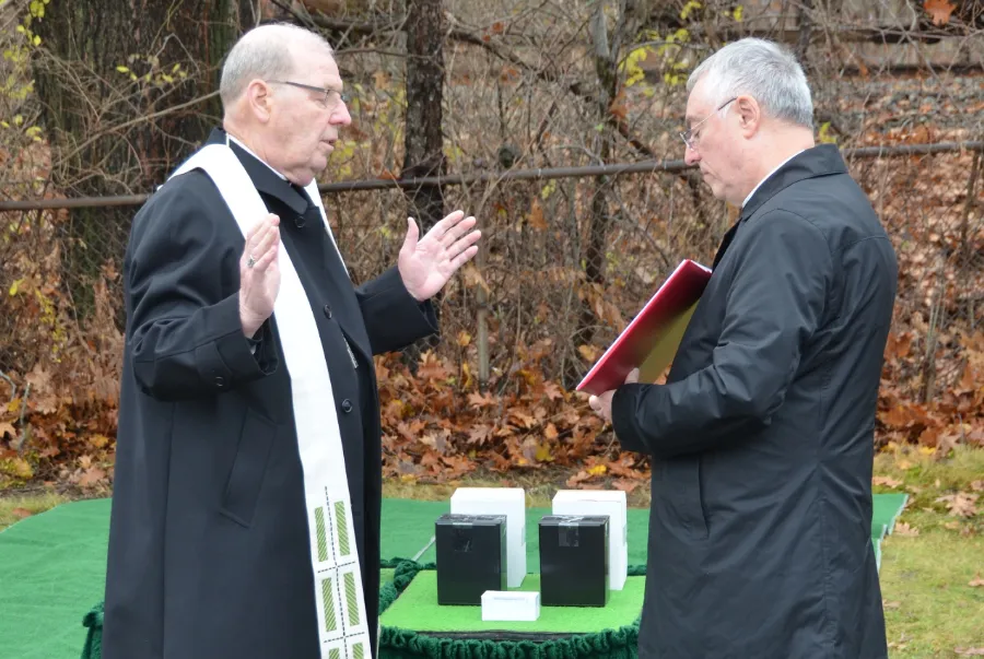 Bishop Robert Deeley leads a committal of unclaimed cremated remains at the Old Cemetery at Calvary in South Portland, Maine, Nov. 22, 2021.?w=200&h=150