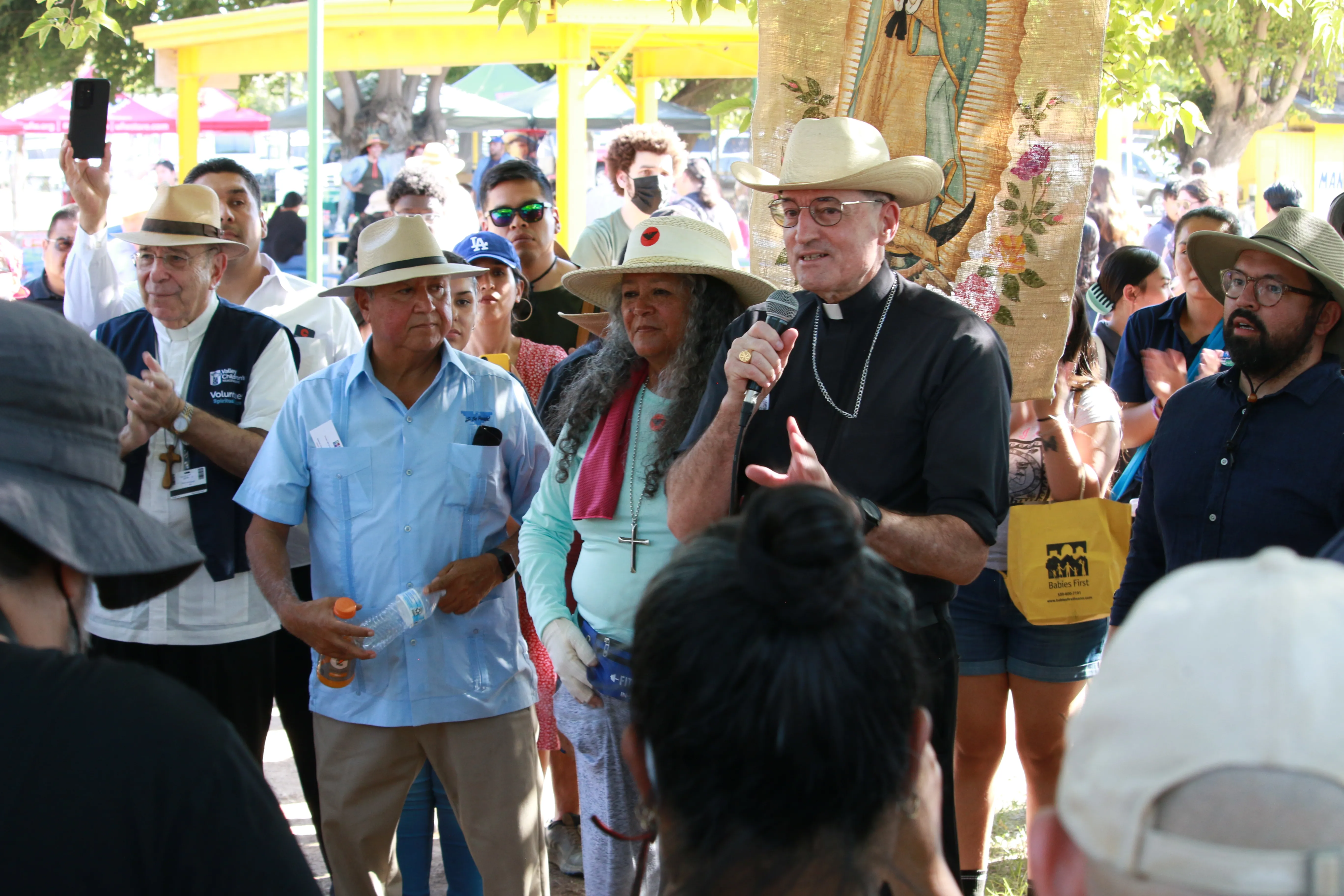 Bishop Joseph Brennan of Fresno speaks at a rally of the UFW march for a labor union voting rights bill in Calwa, Calif., Aug. 11, 2022.?w=200&h=150