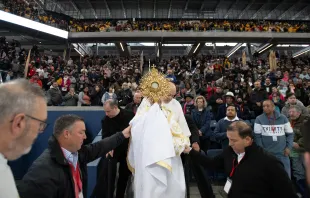Brooklyn Bishop Robert Brennan leads a Eucharistic procession inside a packed Louis Armstrong Stadium in Brooklyn, New York, on April 20, 2024. Credit: Jeffrey Bruno