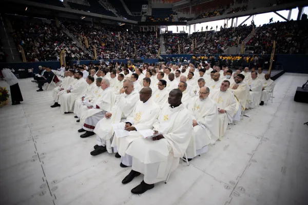 Priests who concelebrated Mass with Bishop Robert Brennan at Louis Armstrong Stadium on April 20, 2024. Credit: Jeffrey Bruno