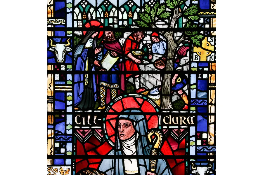 St. Brigid of Kildare building the Church of the Oak, detail from a window of St Etheldreda's church in London.?w=200&h=150