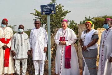 Apostolic Nuncio Archbishop Michael Francis Crotty unveils the new sign of Pope Benedict XVI Street in Burkina Faso’s capital, Ouagadougou
