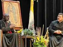 Cardinal Robert Sarah speaks alongside Father Guillermo Gutiérrez at the lecture at La Salle University in Mexico City on June 26, 2023.