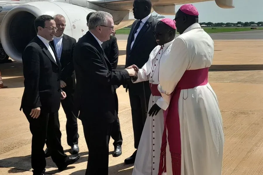 Archbishop Stephen Ameyu Martin receives Cardinal Pietro Parolin upon the cardinal’s arrival in Juba, South Sudan, Aug. 14, 2023.?w=200&h=150