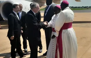 Archbishop Stephen Ameyu Martin receives Cardinal Pietro Parolin upon the cardinal’s arrival in Juba, South Sudan, Aug. 14, 2023. Credit: Sudan/South Sudan Catholic Bishops’ Conference