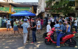 People queue to buy food in Havana on March 27, 2024. Claims of lack of food coupled with long blackouts, which affected almost the entire Cuban population in recent weeks, led hundreds of people to demonstrate on March 17 in at least four cities in the country, in the largest protests recorded since the historic anti-government marches of July 11, 2021. Credit: YAMIL LAGE/AFP via Getty Images