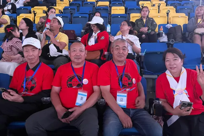 Chinese Catholics early await Pope Francis' Mass in Mongolia's Steppe Arena on Sept. 3, 2023.