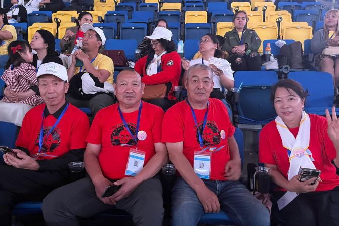 Chinese Catholics early await Pope Francis' Mass in Mongolia's Steppe Arena on Sept. 3, 2023.