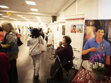 Visitors check out the exhibit on Eucharistic miracles at Christ the King Church near Hollywood on June 11, the day it opened.
