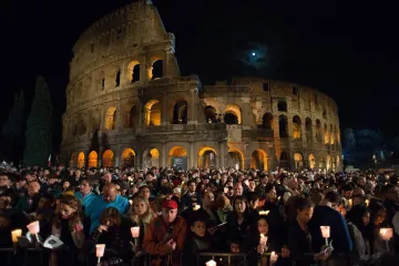 Pilgrims gather for the Stations of the Cross at the Colosseum in Rome on Good Friday, April 3, 2015.